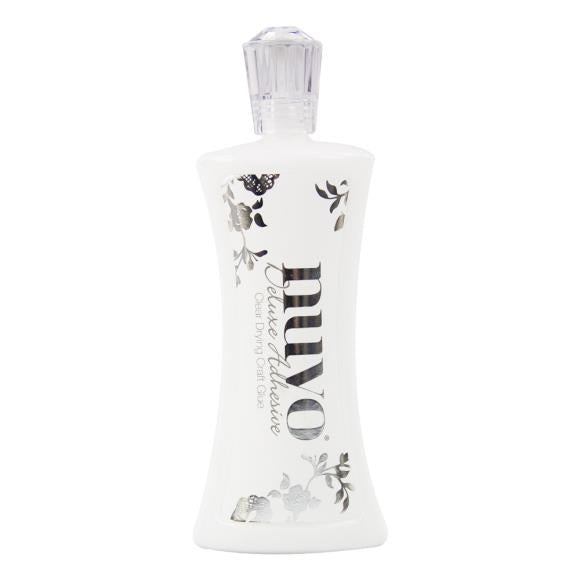C. Nuvo Deluxe Adhesive 4fl. oz